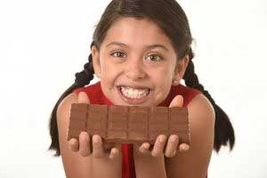 girl with chocolate bar