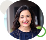 Dr Julia Getzelman, MD, Pediatrician at GetzWell Pediatrics In San Francisco wearing a navy blue shirt